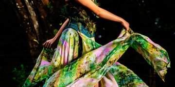 woman in green and purple floral dress