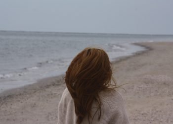 a person standing on a beach