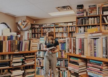 woman holding books