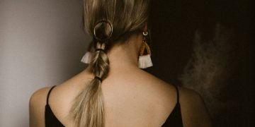 woman in black tank top