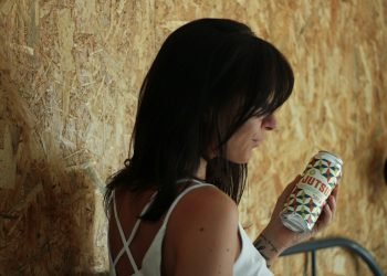 woman holding bottle