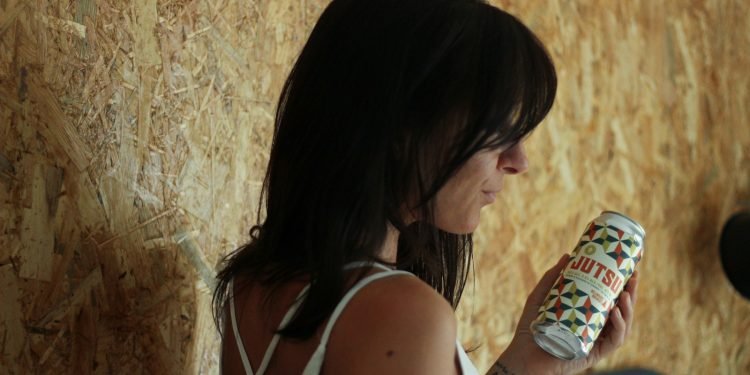 woman holding bottle