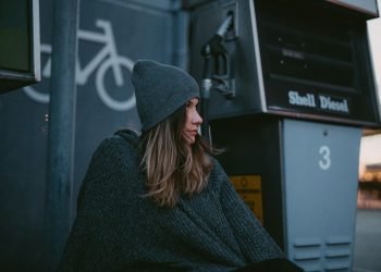 woman wearing black knit cap