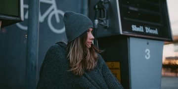 woman wearing black knit cap