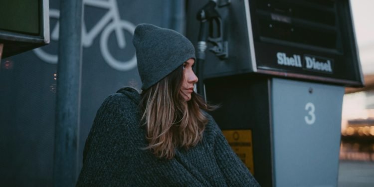 woman wearing black knit cap