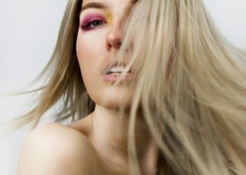 topless woman with blonde hair