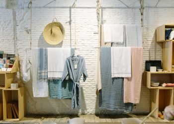 assorted-color towels hanging inside room