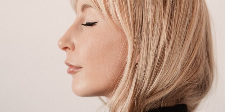 woman in black turtleneck shirt